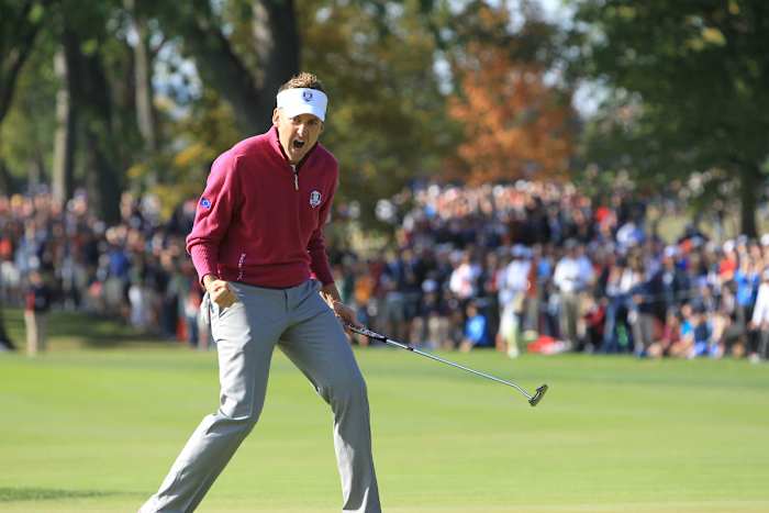Ian Poulter celebrates after holing a putt at Medinah in the 2012 Ryder Cup.